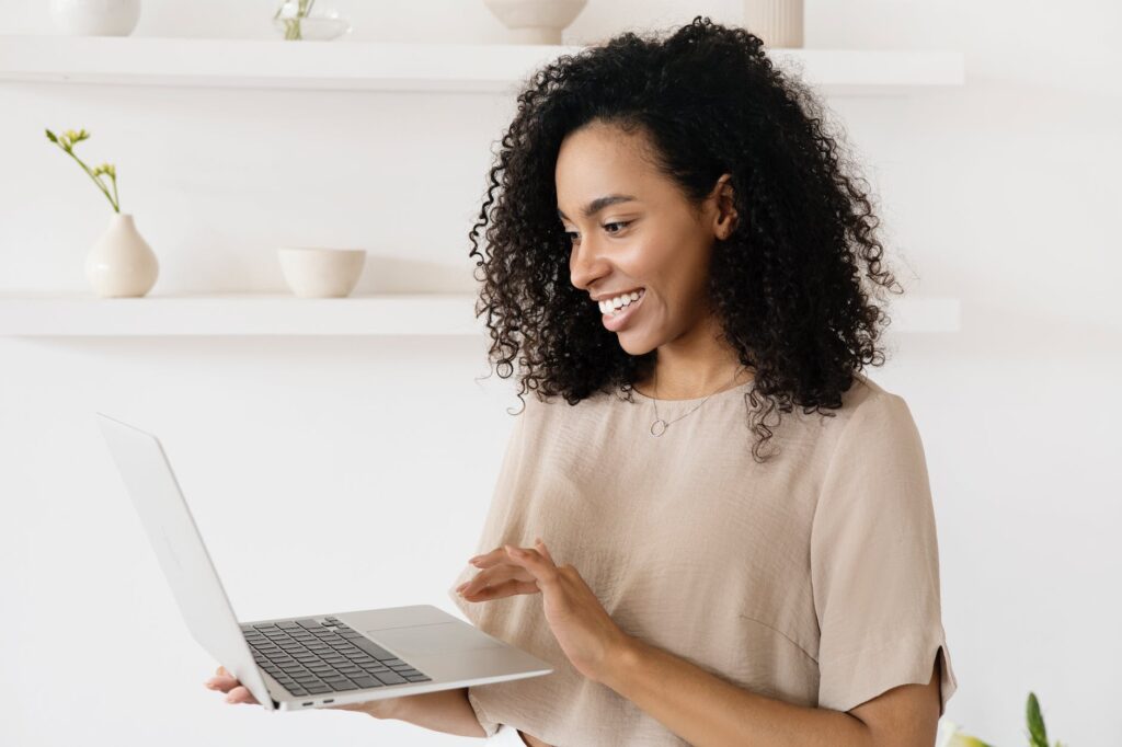 a woman using a laptop